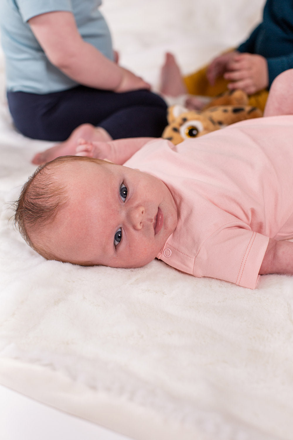 Organic Short Sleeve Bodysuit in Seashell Pink